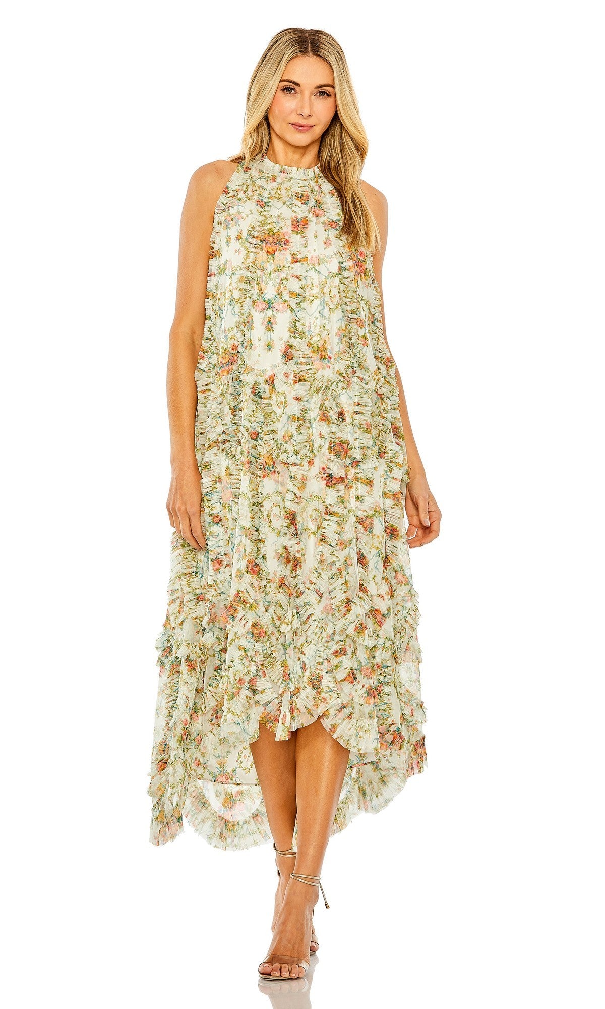 An elegant woman stands facing forward against a white background, wearing the Mac Duggal 8489 Midi Party Dress in Ivory Multi—a sleeveless, high-neck floral midi dress with micro ruffle accents—paired with delicate strappy heels.